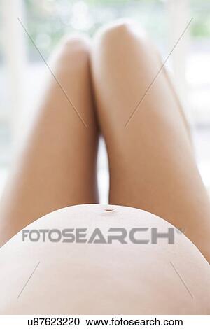 Pregnant woman's abdomen View Large Photo Image Stock Image - Pregnant woman's abdomen. Fotosearch