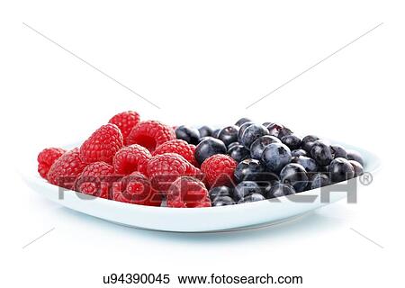 Stock Photography - Raspberries and bilberries. Fotosearch