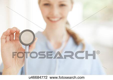 Stock Image - Stethoscope examination. Fotosearch