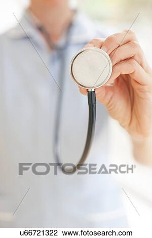 Stock Image - Stethoscope examination. Fotosearch