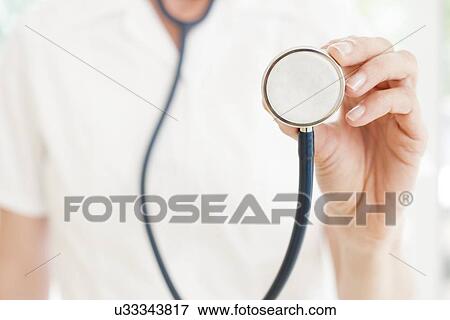 Stock Photo - Stethoscope examination. Fotosearch