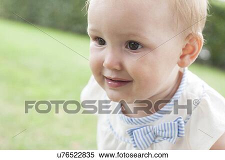 Stock Photography - Ten month old baby girl. Fotosearch