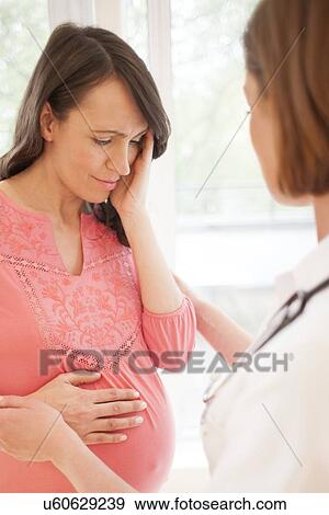 Upset pregnant woman View Large Photo Image Stock Photo - Upset pregnant woman. Fotosearch