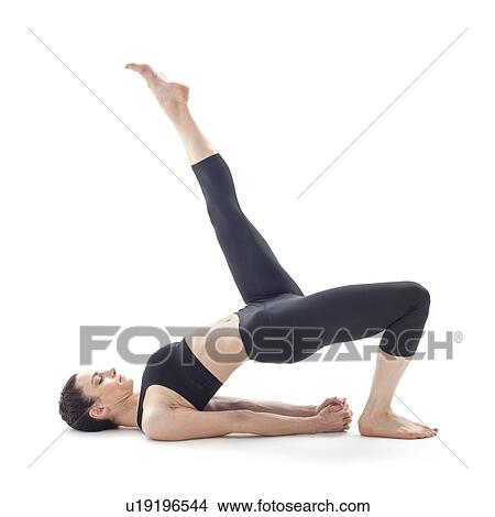 Woman practicing yoga View Large Photo Image Picture - Woman practicing yoga. Fotosearch