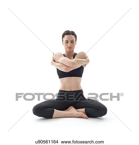 Picture - Woman practicing yoga. Fotosearch