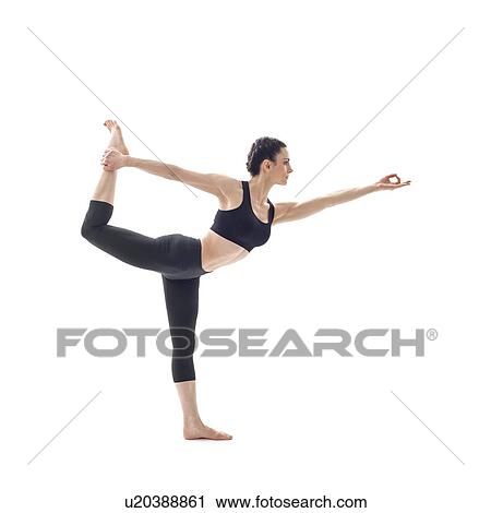 Woman practicing yoga View Large Photo Image Stock Image - Woman practicing yoga. Fotosearch