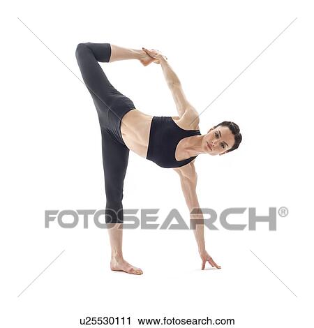 Woman practicing yoga View Large Photo Image Stock Image - Woman practicing yoga. Fotosearch