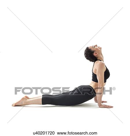 Stock Image - Woman practicing yoga. Fotosearch