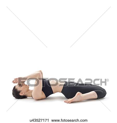Woman practicing yoga View Large Photo Image Stock Image - Woman practicing yoga. Fotosearch
