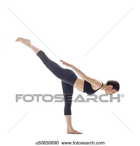 Woman practicing yoga View Large Photo Image Stock Image - Woman practicing yoga. Fotosearch