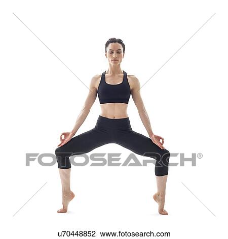 Woman practicing yoga View Large Photo Image Stock Image - Woman practicing yoga. Fotosearch