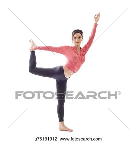 Woman practicing yoga View Large Photo Image Stock Image - Woman practicing yoga. Fotosearch