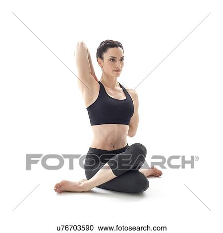 Woman practicing yoga View Large Photo Image Stock Image - Woman practicing yoga. Fotosearch