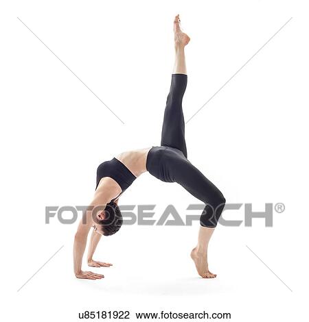 Woman practicing yoga View Large Photo Image Stock Image - Woman practicing yoga. Fotosearch