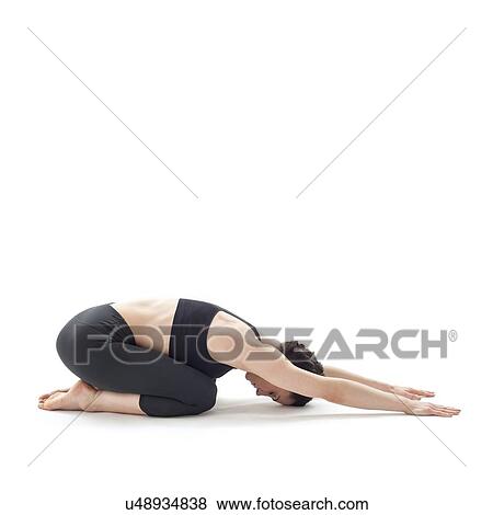 Stock Photo - Woman practicing yoga. Fotosearch