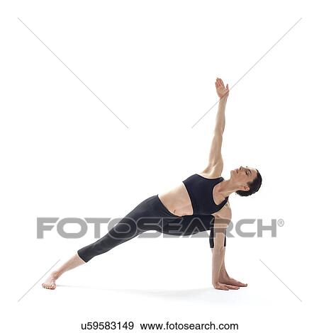 Stock Photo - Woman practicing yoga. Fotosearch
