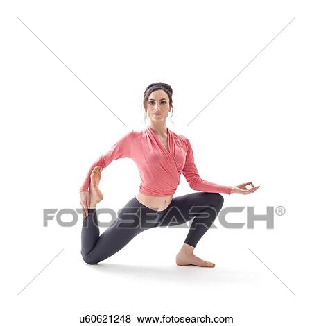 Stock Photo - Woman practicing yoga. Fotosearch