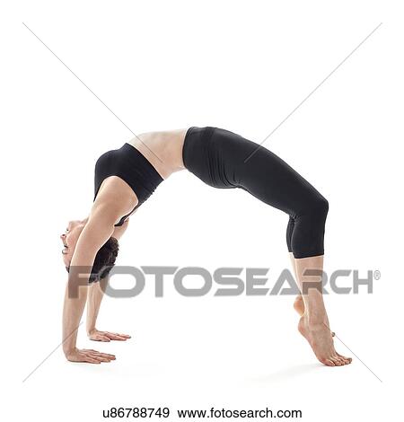 Woman practicing yoga View Large Photo Image Stock Photo - Woman practicing yoga. Fotosearch
