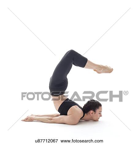 Woman practicing yoga View Large Photo Image Stock Photo - Woman practicing yoga. Fotosearch