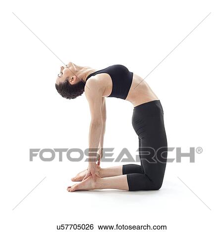 Stock Photograph - Woman practicing yoga. Fotosearch