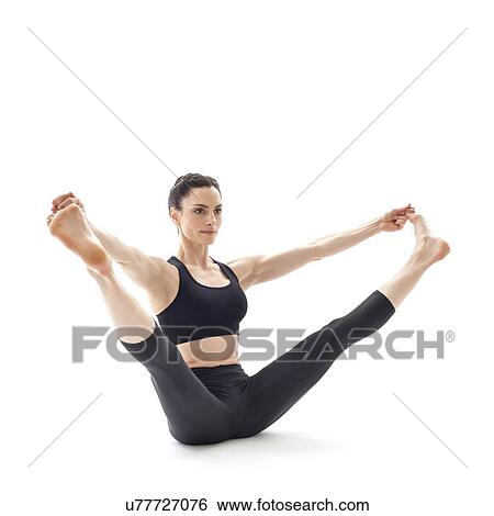Woman practicing yoga View Large Photo Image Stock Photograph - Woman practicing yoga. Fotosearch