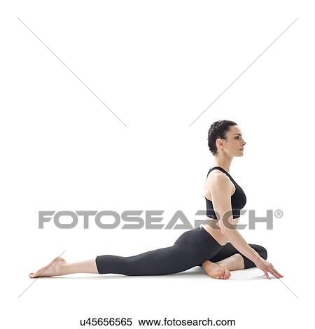 Stock Photography - Woman practicing yoga. Fotosearch
