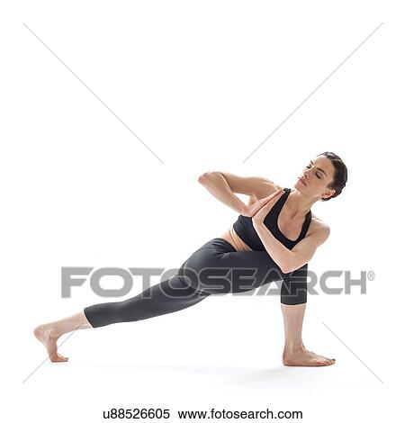 Woman practicing yoga View Large Photo Image Stock Photography - Woman practicing yoga. Fotosearch