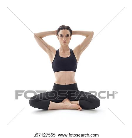 Stock Photography - Woman practicing yoga. Fotosearch