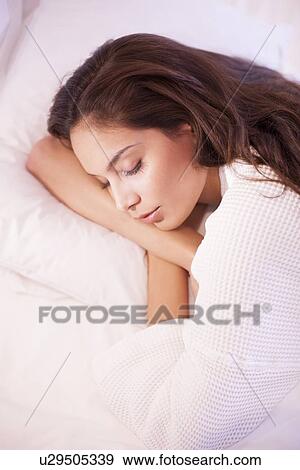 Stock Photo - Woman sleeping. Fotosearch