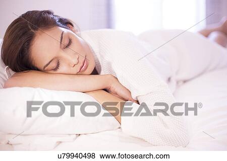 Stock Photo - Woman sleeping. Fotosearch