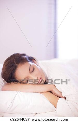 Stock Photo - Woman sleeping. Fotosearch