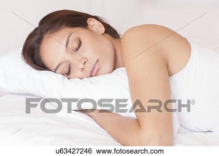 Woman sleeping View Large Photo Image Stock Photograph - Woman sleeping. Fotosearch