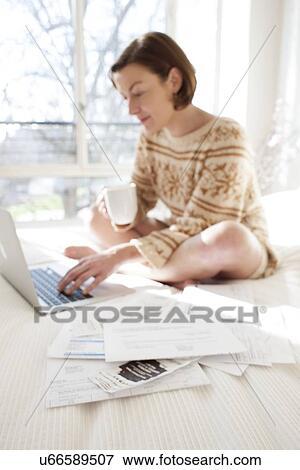 Woman using laptop computer View Large Photo Image Stock Photo - Woman using laptop computer. Fotosearch