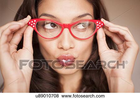Stock Photo - Woman wearing glasses. Fotosearch