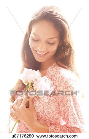 Woman with flowers View Large Photo Image Stock Image - Woman with flowers. Fotosearch