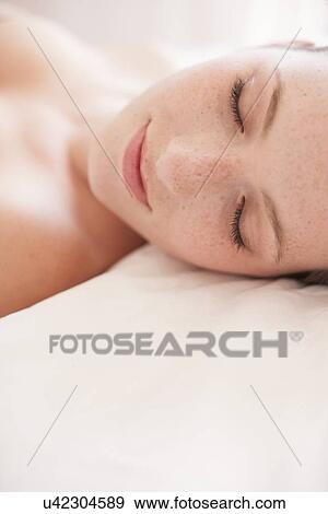 Young woman resting View Large Photo Image Stock Photo - Young woman resting. Fotosearch