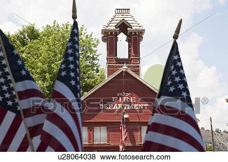 Ridgway historic western firehouse with US Flags on July 4 View Large Photo Image Stock Photo - Ridgway historic western firehouse with US Flags on July 4. Fotosearch