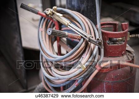Stock Photo - Acetylene lance in engineering workshop. Fotosearch