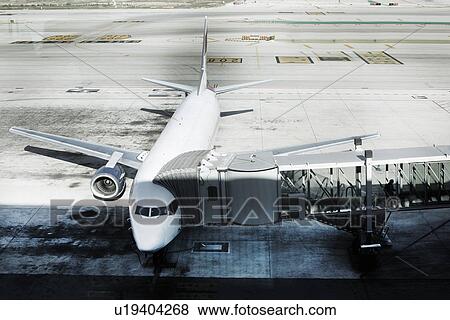 Airplane standing on tarmac View Large Photo Image Stock Photo - Airplane standing on tarmac. Fotosearch