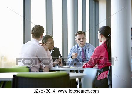 Business colleagues in meeting View Large Photo Image Picture - Business colleagues in meeting. Fotosearch