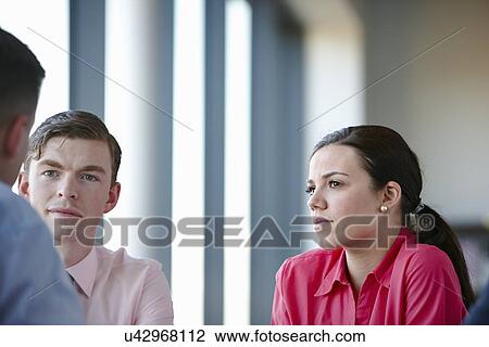 Business colleagues in meeting View Large Photo Image Stock Image - Business colleagues in meeting. Fotosearch