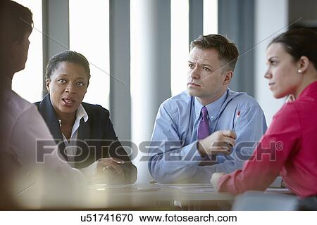 Business colleagues in meeting View Large Photo Image Stock Image - Business colleagues in meeting. Fotosearch