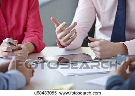 Business colleagues in meeting View Large Photo Image Stock Photography - Business colleagues in meeting. Fotosearch
