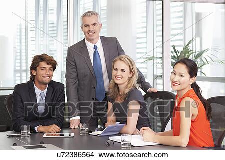 Business team meeting in office View Large Photo Image Picture - Business team meeting in office. Fotosearch