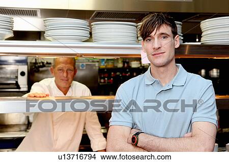 Chef and waiter in kitchen View Large Photo Image Picture - Chef and waiter in kitchen. Fotosearch