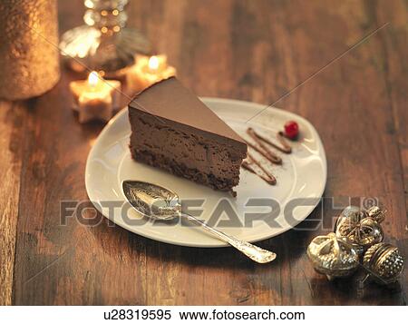 Chocolate and chestnut torte amongst festive decorations View Large Photo Image Stock Photography - Chocolate and chestnut torte amongst festive decorations. Fotosearch