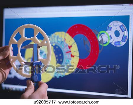 Close up of engineer designing industrial clutch using CAD software View Large Photo Image Stock Photo - Close up of engineer designing industrial clutch using CAD software. Fotosearch