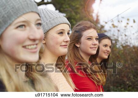 Close up of four teenage girls outdoors View Large Photo Image Picture - Close up of four teenage girls outdoors. Fotosearch