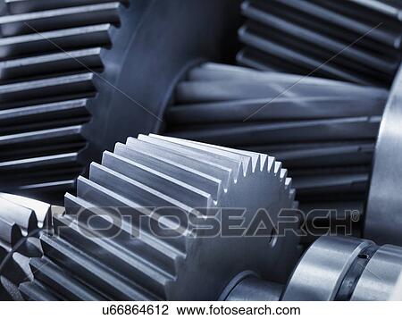 Stock Image - Close up of gears in industrial gearbox. Fotosearch
