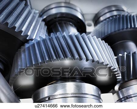 Stock Photograph - Close up of gears in industrial gearbox. Fotosearch